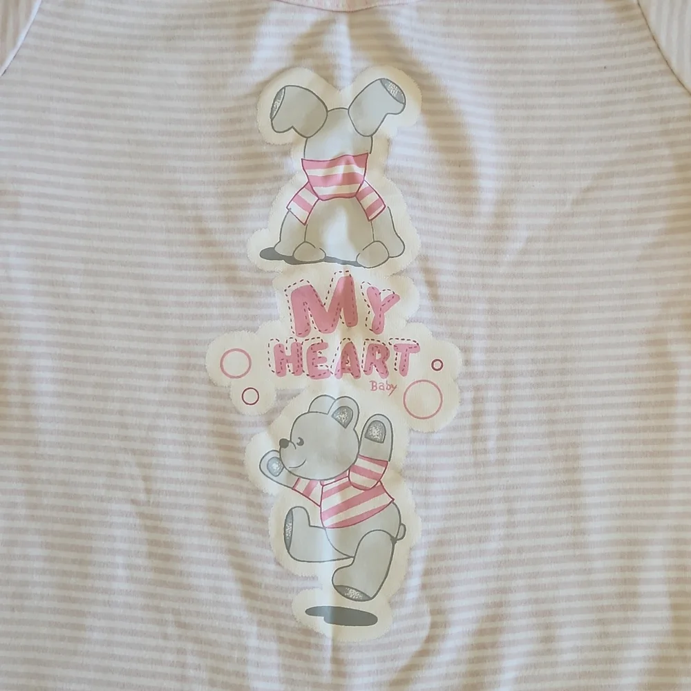 One Piece footed soft pink bodysuit